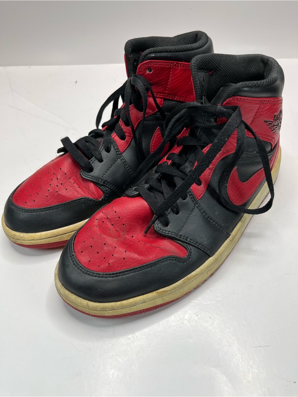 Nike Retro High-Top Sneakers in Red and Black
